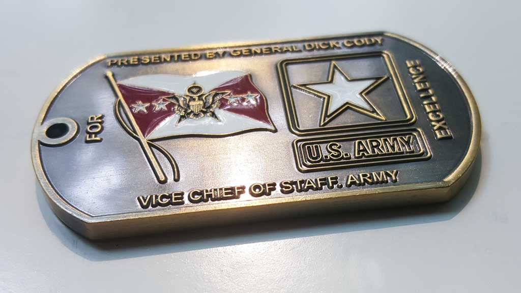 Dog tag challenge coin with stars on front