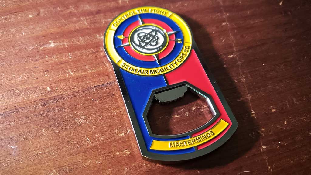 Air mobility challenge coin bottle opener front