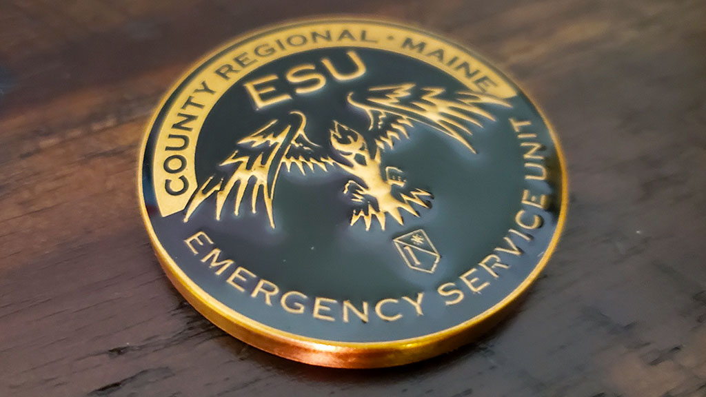 emergency service unit coin front