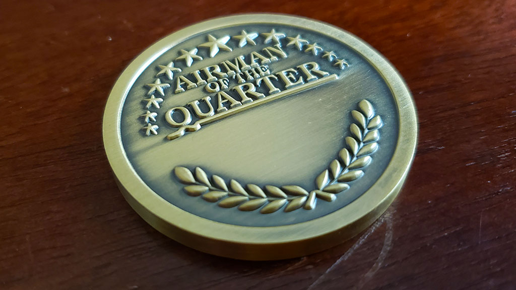 airman of the quarter coin back