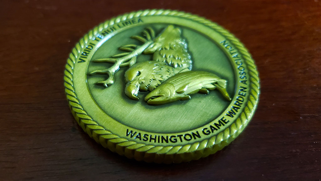 fish and wildlife challenge coin back