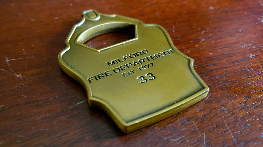 milford fire department coin back